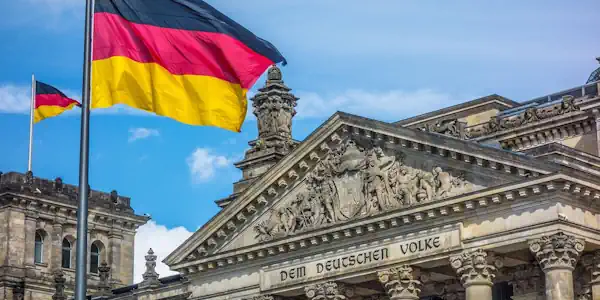 Private Investigator Germany , Reichstag in Berlin with German flag.